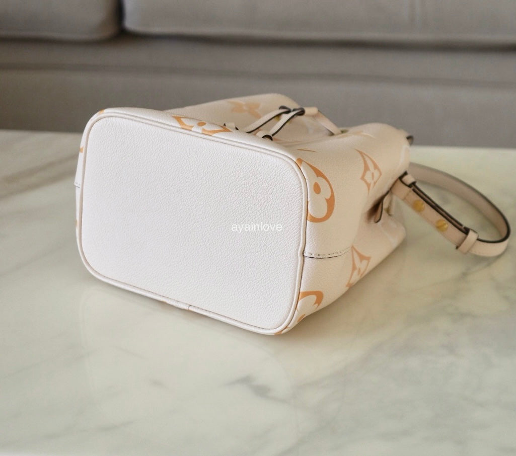 LOUIS VUITTON Neo Noe BB Empreinte Beige Cream Saffron Giant Monogram By The Pool