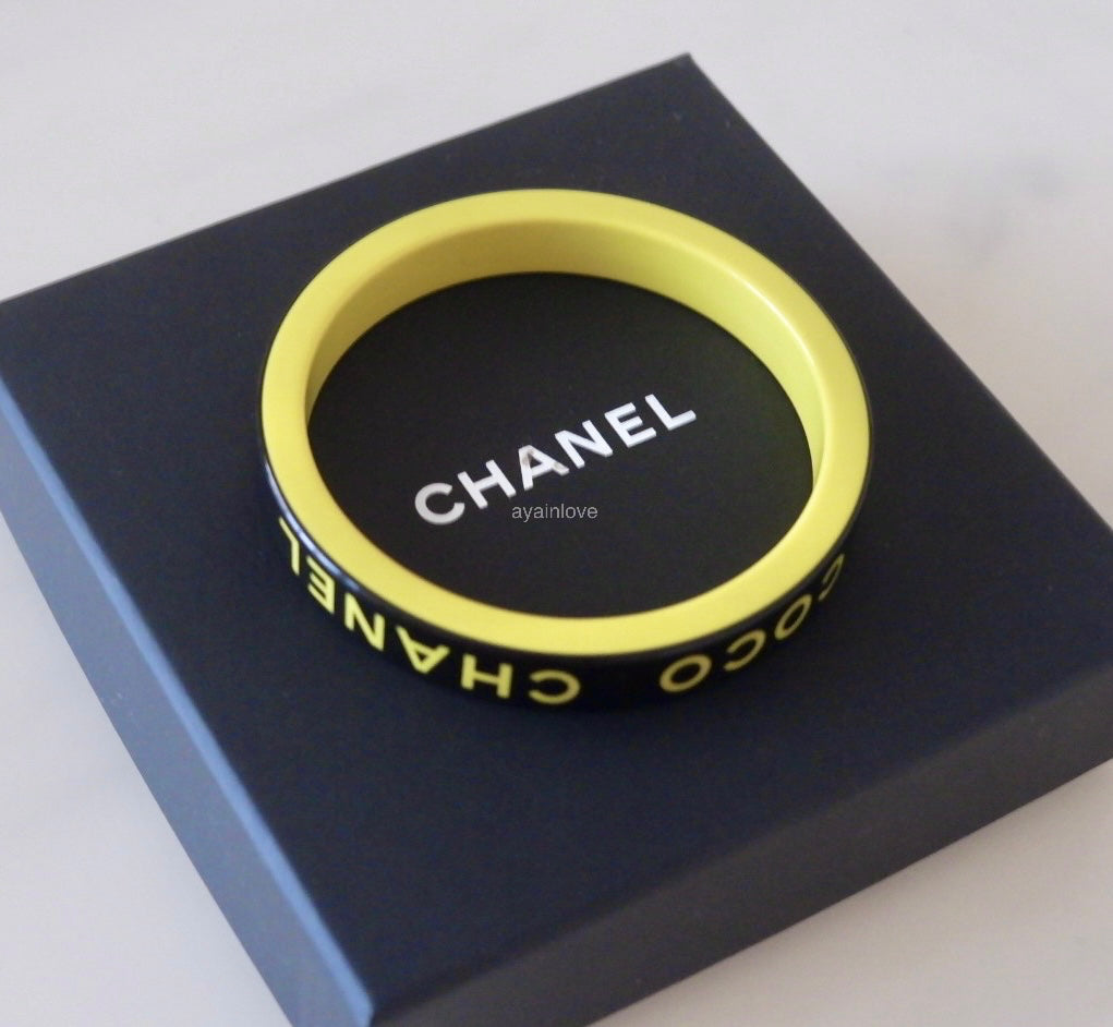 CHANEL 22S Yellow Black Resin Coco Bangle Bracelet