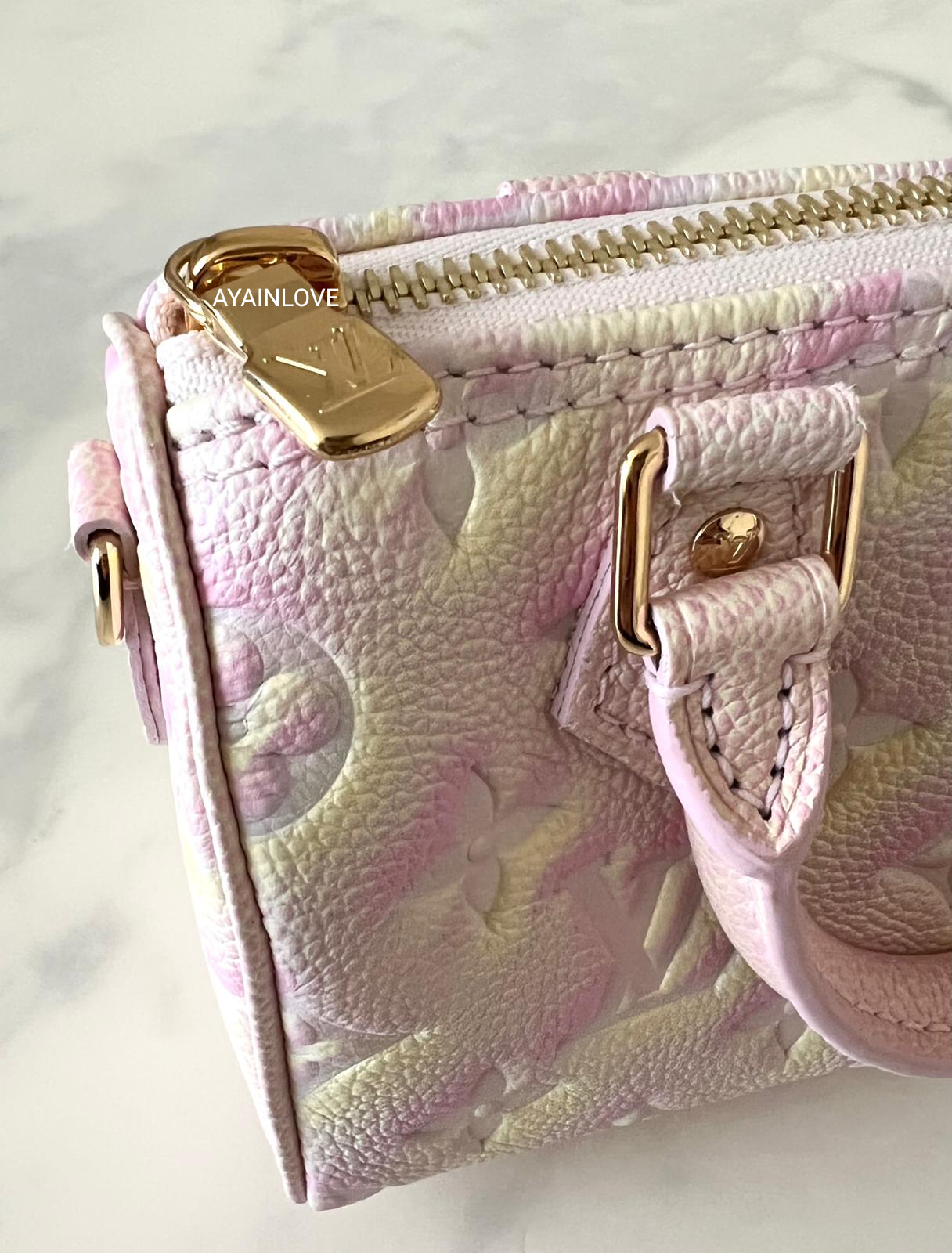 LOUIS VUITTON Nano Speedy Stardust Pink Leather Empreinte Gold Hardware