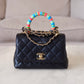 CHANEL Black Goatskin Coco Rainbow Handle Extra Mini 19cm Bag Light Gold Hardware