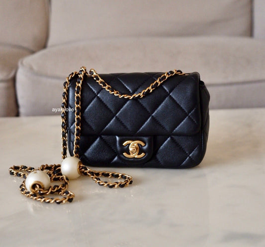 CHANEL 24S Black Lambskin Twin Pearls Quilted Mini Flap Bag Adjustable Gold Hardware