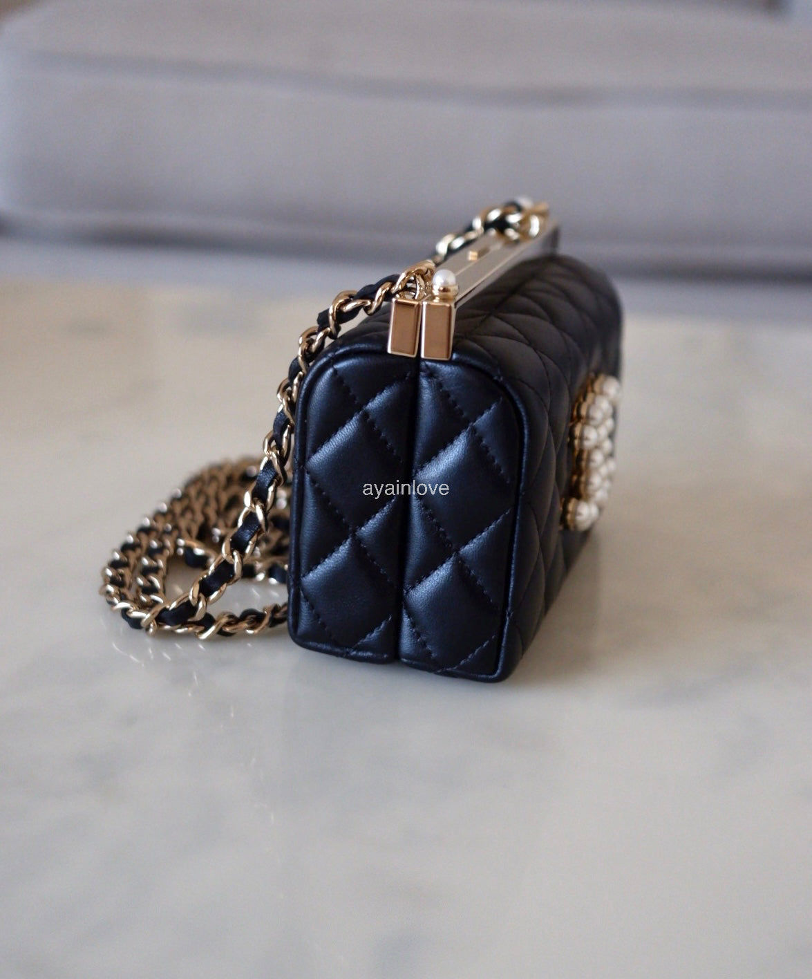 CHANEL 23A Black Lambskin CC Pearl Frame Clutch Bag Light Gold Hardware