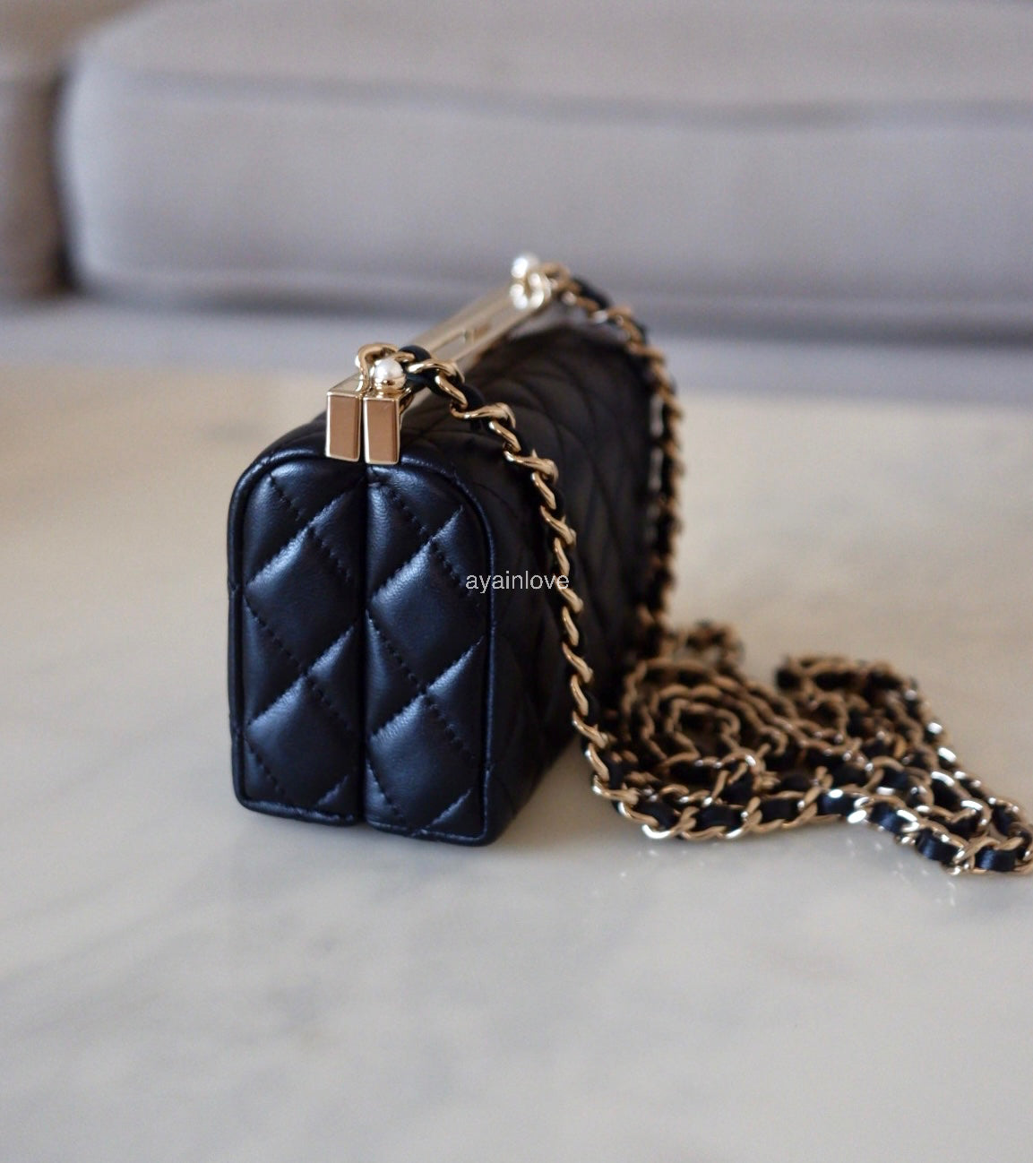 CHANEL 23A Black Lambskin CC Pearl Frame Clutch Bag Light Gold Hardware