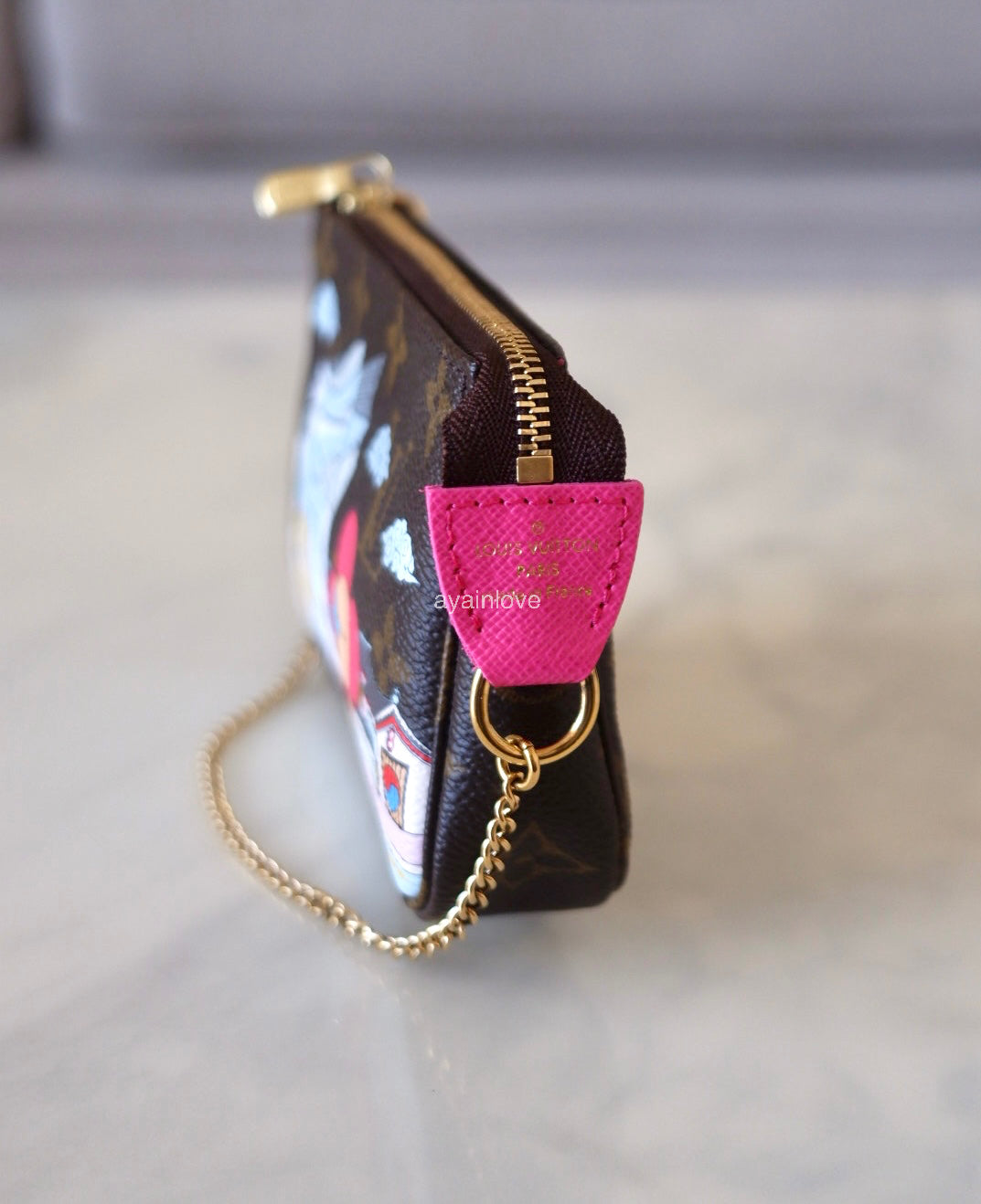 LOUIS VUITTON LV Holiday Limited Edition Vivienne Seoul Korea Animation 2022 Mini Pochette Monogram Gold Hardware