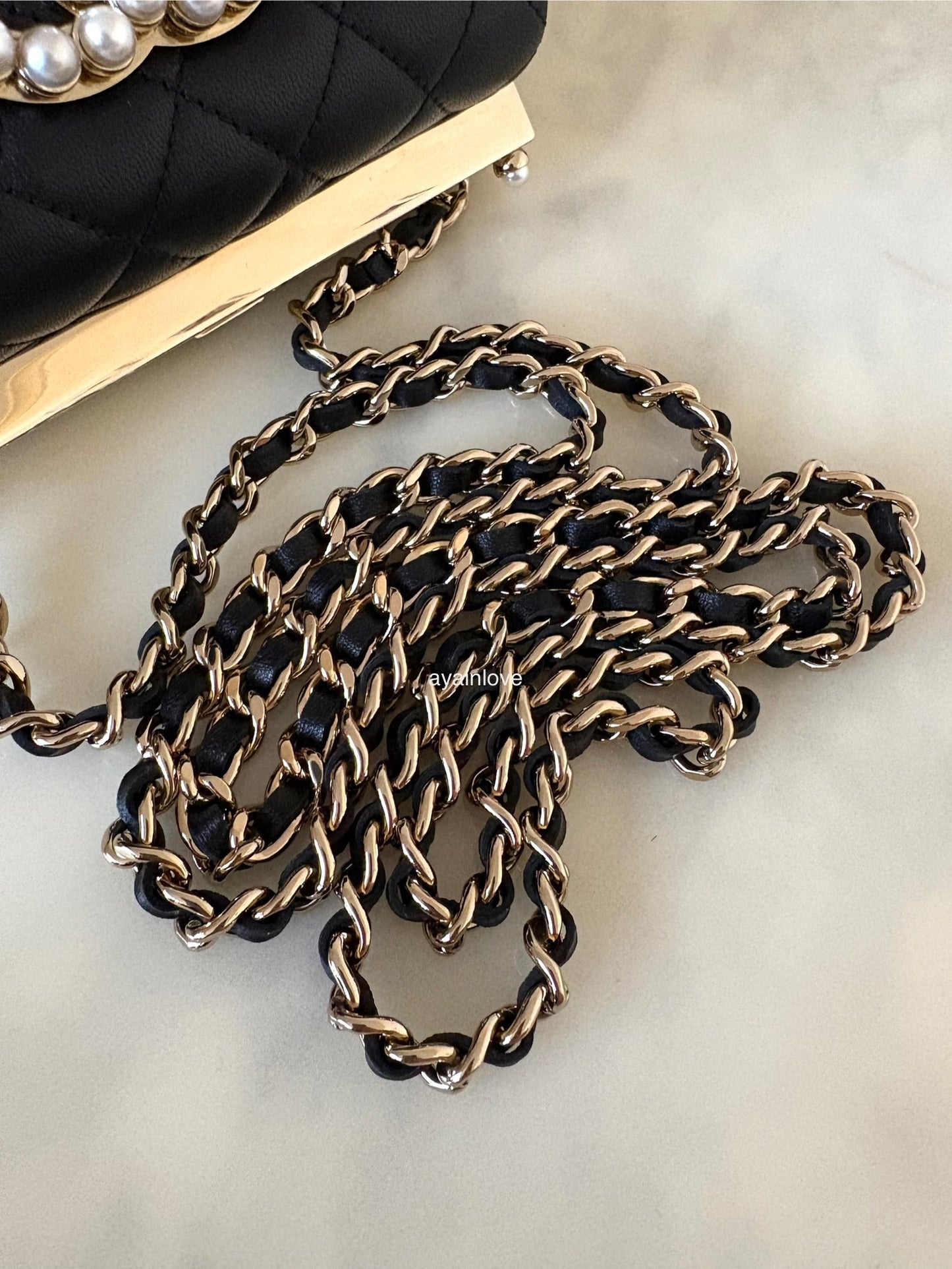 CHANEL 23A Black Lambskin CC Pearl Frame Clutch Bag Light Gold Hardware