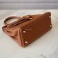 HERMES Kelly 25 Gold Togo Retourne Gold Hardware D Stamp