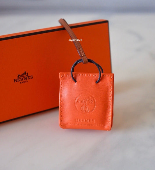 HERMES Orange Leather Shopping Sac Bag Charm