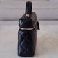 CHANEL 2025 Black Caviar Top Handle Flat Vanity on Chain Light Gold Hardware