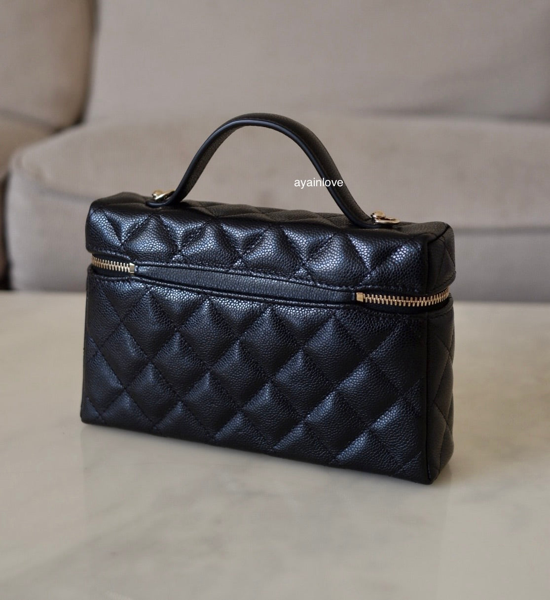 CHANEL Black Caviar Top Handle Flat Vanity on Chain Light Gold Hardware