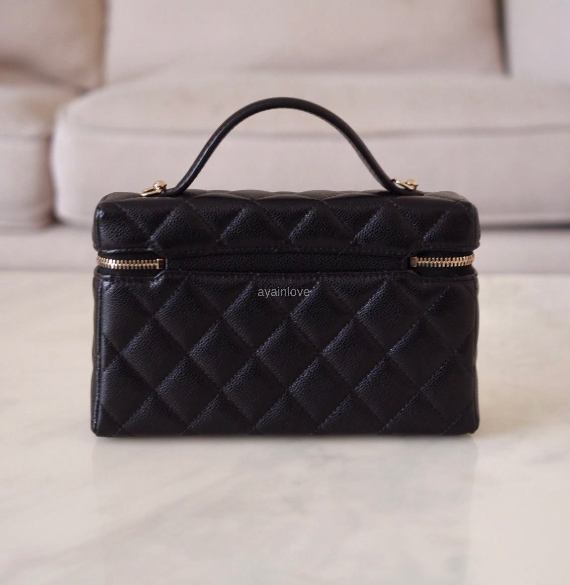 CHANEL 2025 Black Caviar Top Handle Flat Vanity on Chain Light Gold Hardware