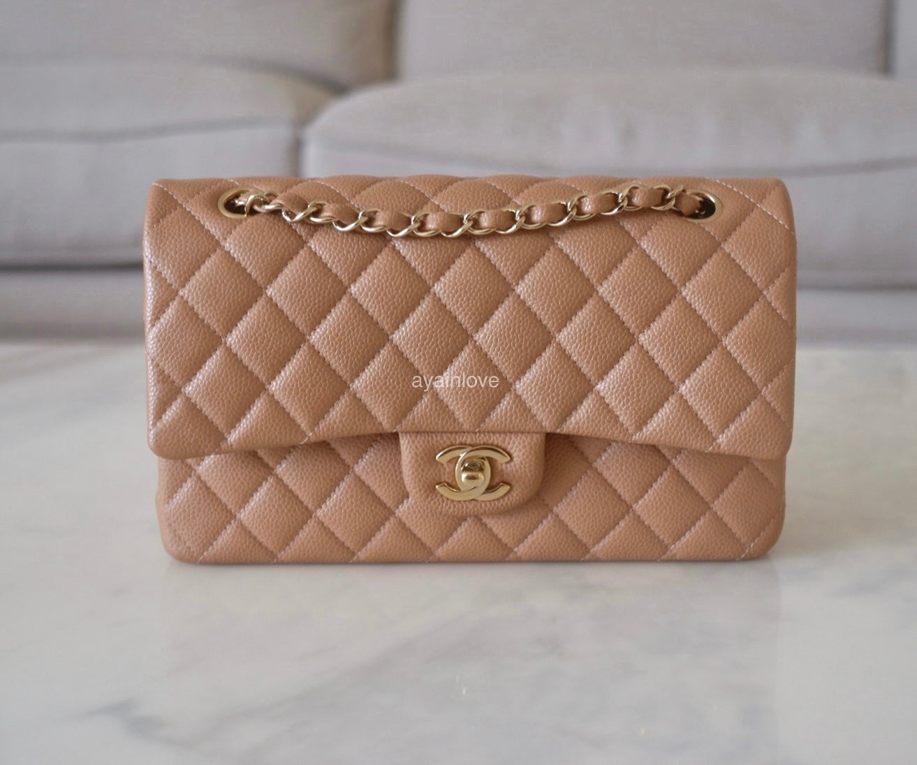 CHANEL 18S Pearly Dark Beige Caviar Medium/Large Classic Flap Light Go –  AYAINLOVE CURATED LUXURIES