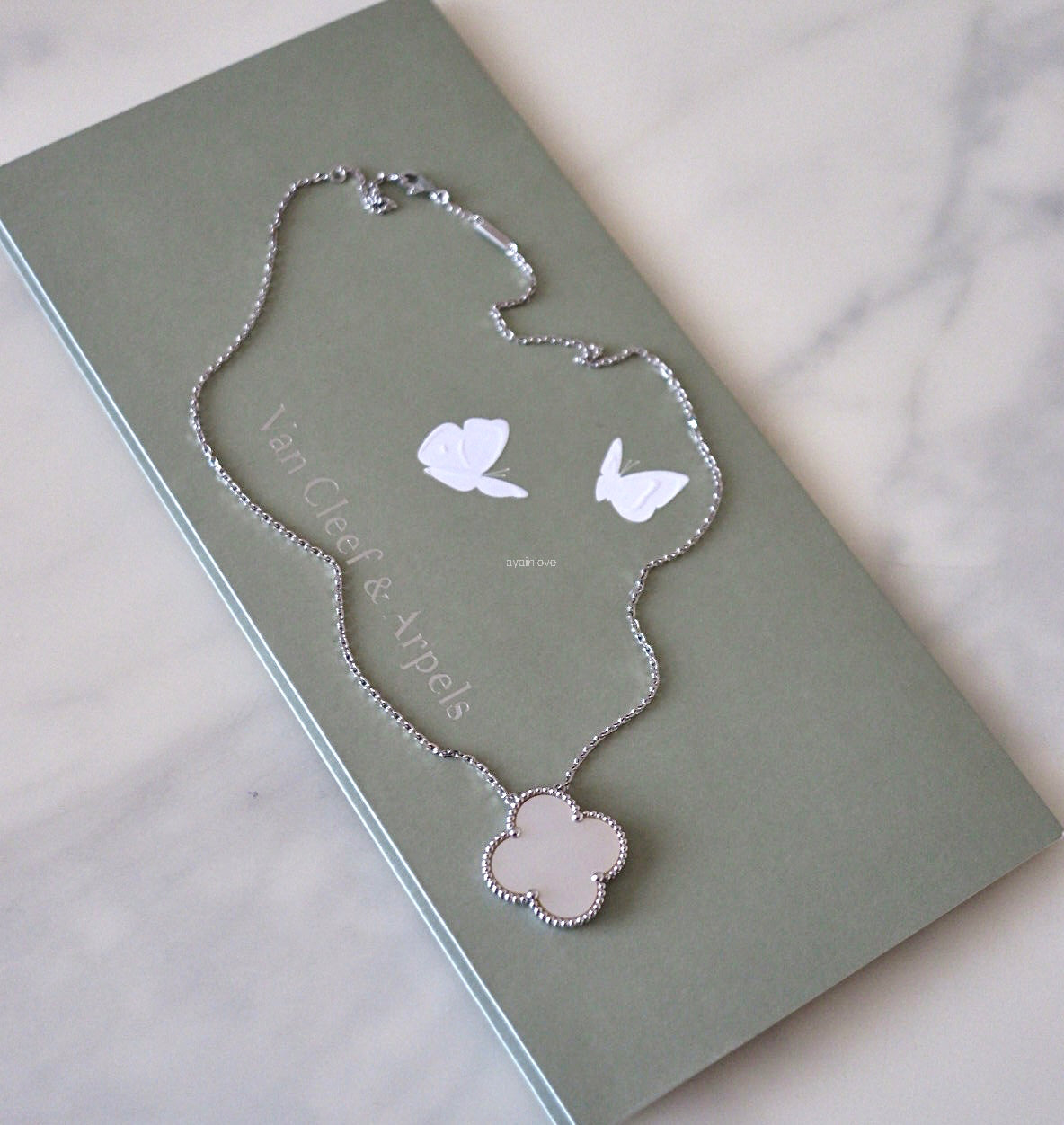 Van Cleef Arpels VCA White Mother of Pearl Magic Alhambra Pendant Necklace 18KT White Gold