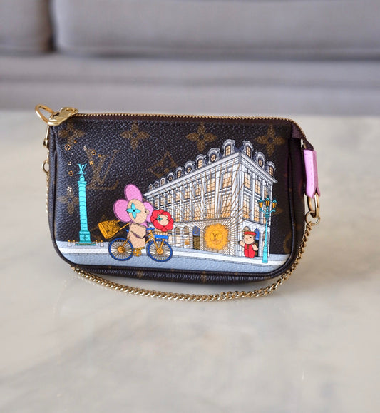 LOUIS VUITTON LV Holiday Limited Edition Vivienne Vendome Paris Animation 2022 Mini Pochette Monogram Gold Hardware
