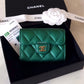 CHANEL 18S Iridescent Emerald Green Caviar XL Snap Card Holder Light Gold Hardware