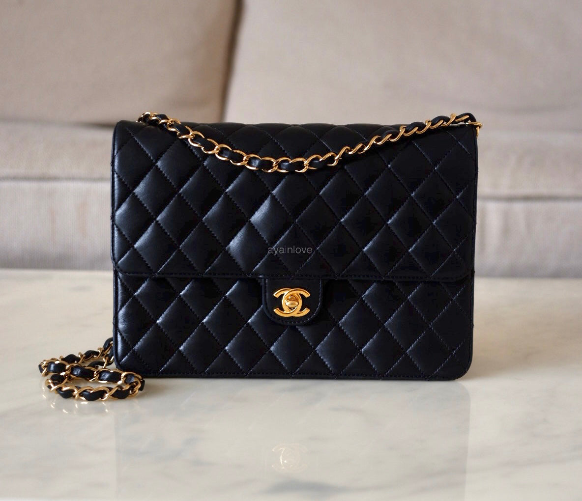 CHANEL Black Lambskin Turnlock Quilted Medium Half Flap Bag Gold Hardware