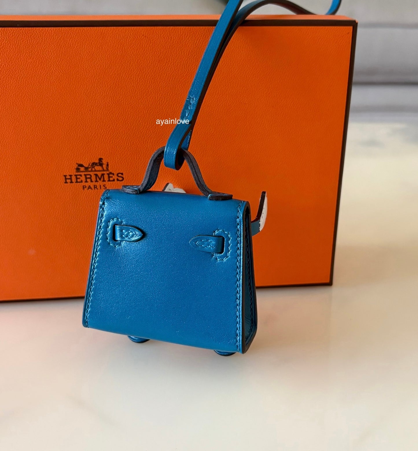 HERMES Kelly Doll Dole Tadelakt Bleu Izmir Bag Charm Palladium Hardware Z Stamp