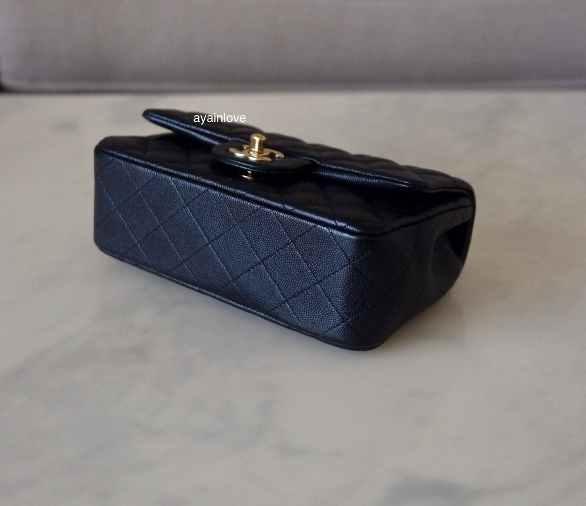 CHANEL 18B Black Caviar Quilted Rectangular Mini Flap Bag Light Gold Hardware