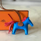 HERMES Rodeo PM Tricolour Blue Zanzibar/Rose Texas/Gold Bag Charm