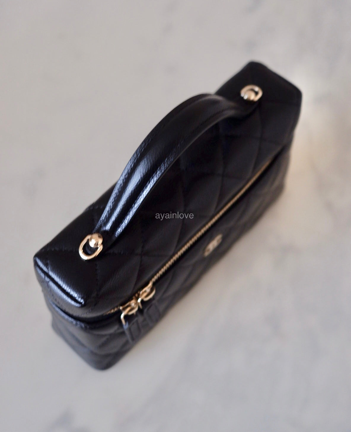 CHANEL 2025 Black Caviar Top Handle Flat Vanity on Chain Light Gold Hardware