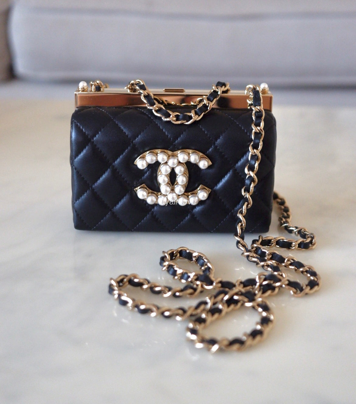 CHANEL 23A Black Lambskin CC Pearl Frame Clutch Bag Light Gold Hardware