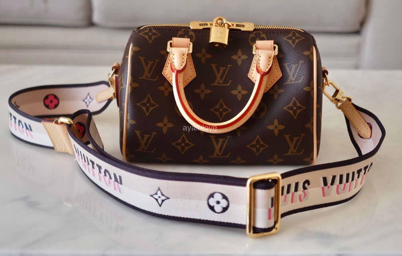 Lv speedy with strap on sale