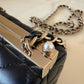 CHANEL 23A Black Lambskin CC Pearl Frame Clutch Bag Light Gold Hardware