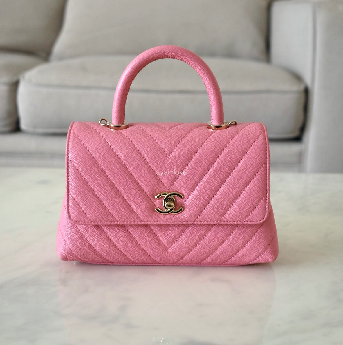 CHANEL Pink Caviar Chevron Small Coco Handle 24 cm Light Gold Hardware