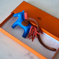 HERMES Rodeo PM Tricolour Blue Zanzibar/Rose Texas/Gold Bag Charm