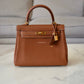 HERMES Kelly 25 Gold Togo Retourne Gold Hardware D Stamp