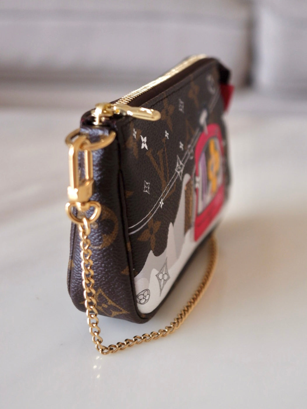 LOUIS VUITTON LV Holiday Limited Edition Vivienne Switzerland Gondola Animation 2022 Mini Pochette Monogram