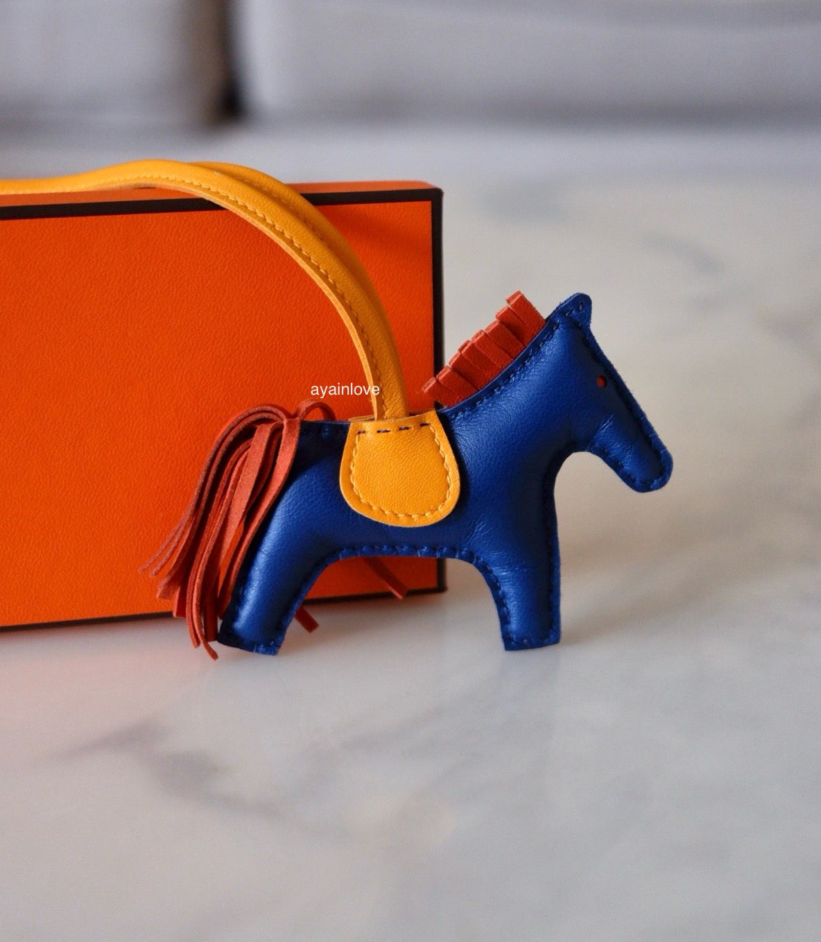 HERMES Rodeo PM Tricolour Blue Sapphire/Jaune D’Or/Natural Bouton Bag Charm
