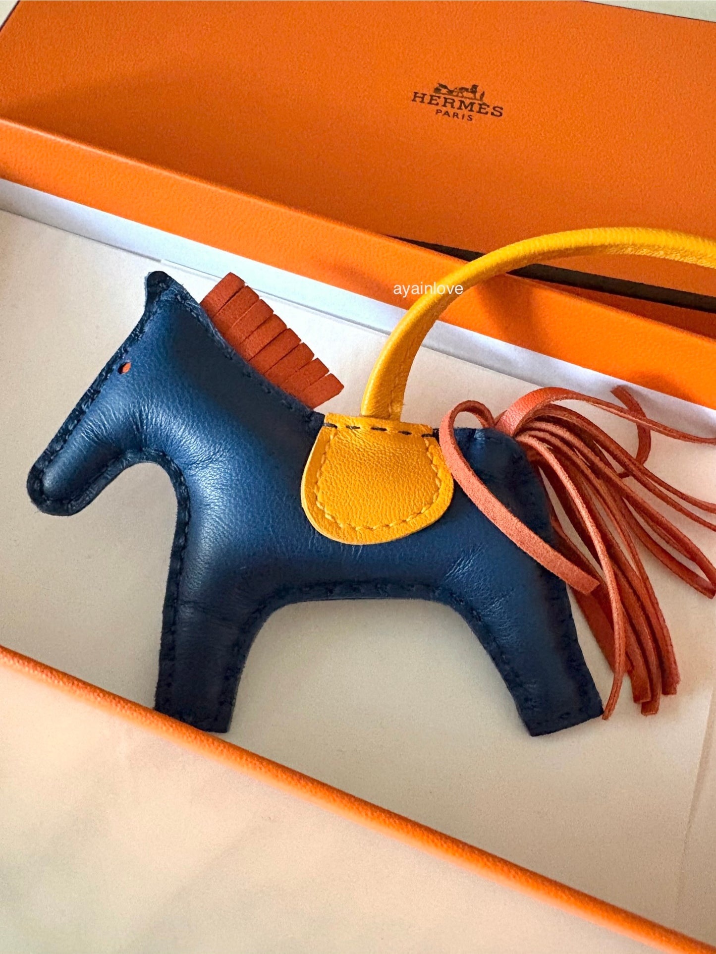 HERMES Rodeo PM Tricolour Blue Sapphire/Jaune D’Or/Natural Bouton Bag Charm