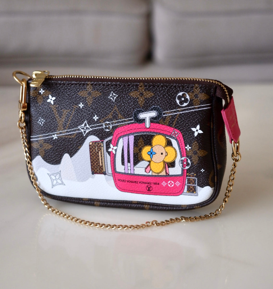 LOUIS VUITTON LV Holiday Limited Edition Vivienne Switzerland Gondola Animation 2022 Mini Pochette Monogram
