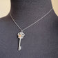 TIFFANY & CO Enchant Butterfly Key Pendant Necklace 950 Platinum White Diamonds and 18KT Rose Gold Pink Diamonds