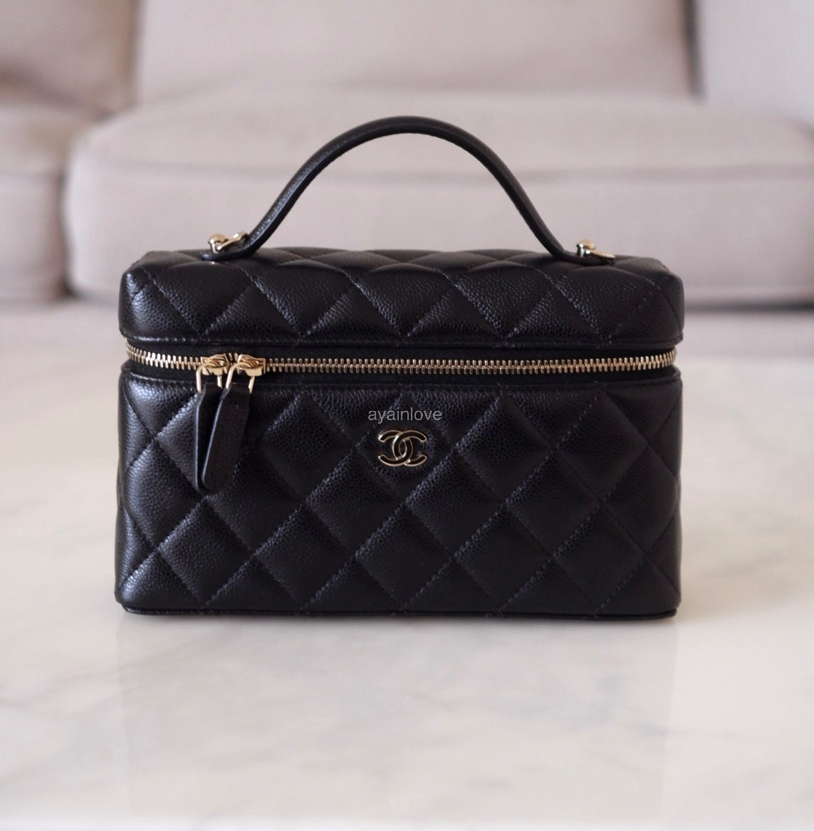 CHANEL 2025 Black Caviar Top Handle Flat Vanity on Chain Light Gold Hardware