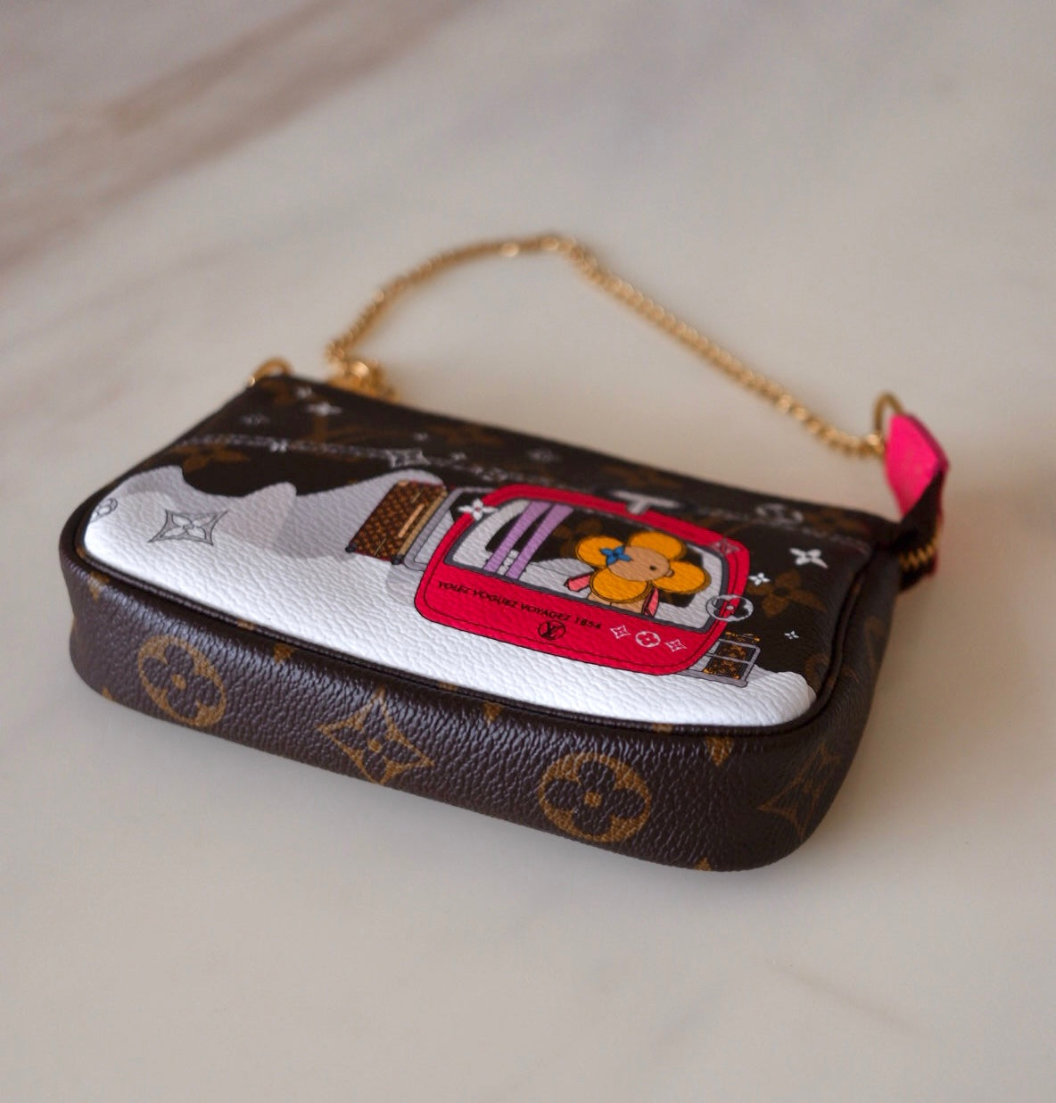 LOUIS VUITTON LV Holiday Limited Edition Vivienne Switzerland Gondola Animation 2022 Mini Pochette Monogram