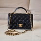 CHANEL Black Lambskin Top Handle Rectangular Mini Gold Hardware
