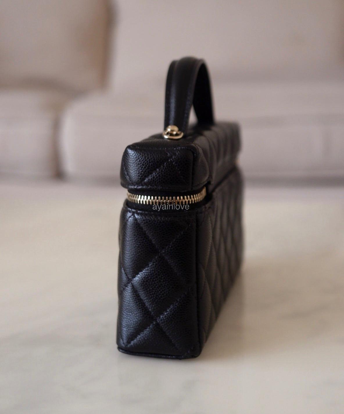 CHANEL 2025 Black Caviar Top Handle Flat Vanity on Chain Light Gold Hardware