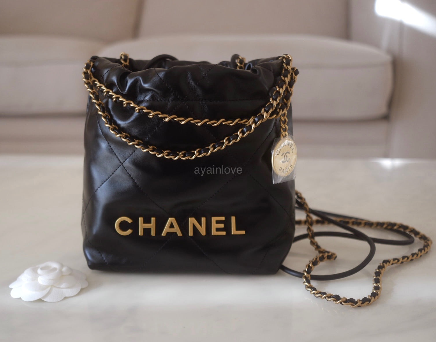 Chanel Quilted Drawstring Bucket Bag Black Calfskin Gold Hardware