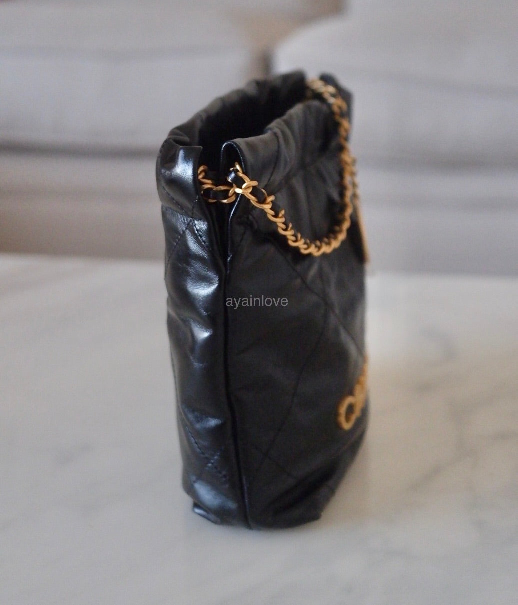chanel black quilted backpack purse