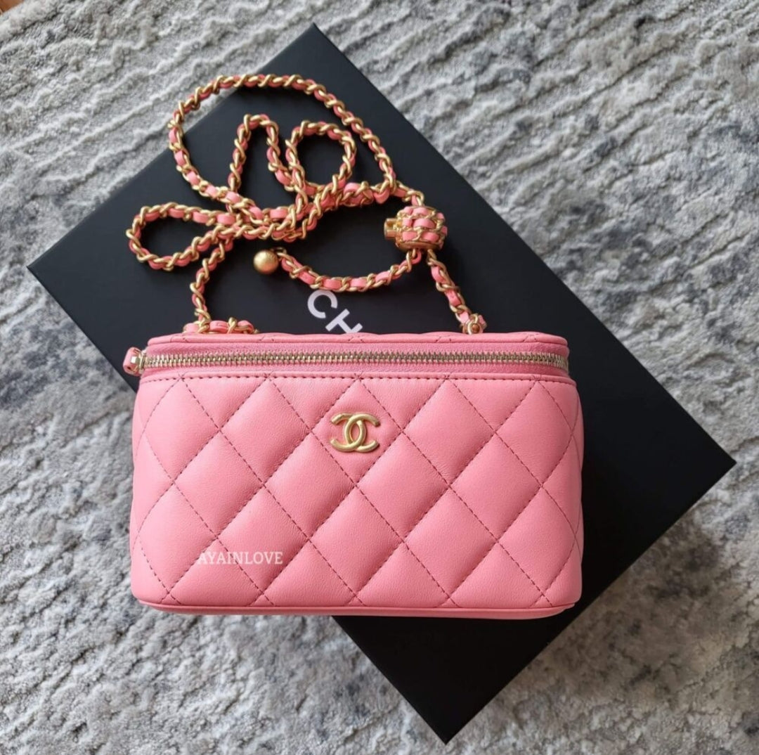 Bonhams : CHANEL PINK CAVIAR QUILTED SMALL VANITY CASE WITH GOLD TONED CHAIN  (includes serial sticker, info booklet, authenticity card, original dust bag  and box)
