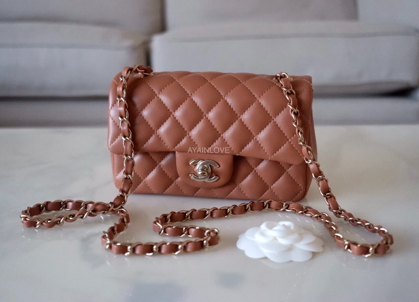 Take a look at some of the features of the Chanel 21P caramel mini bag