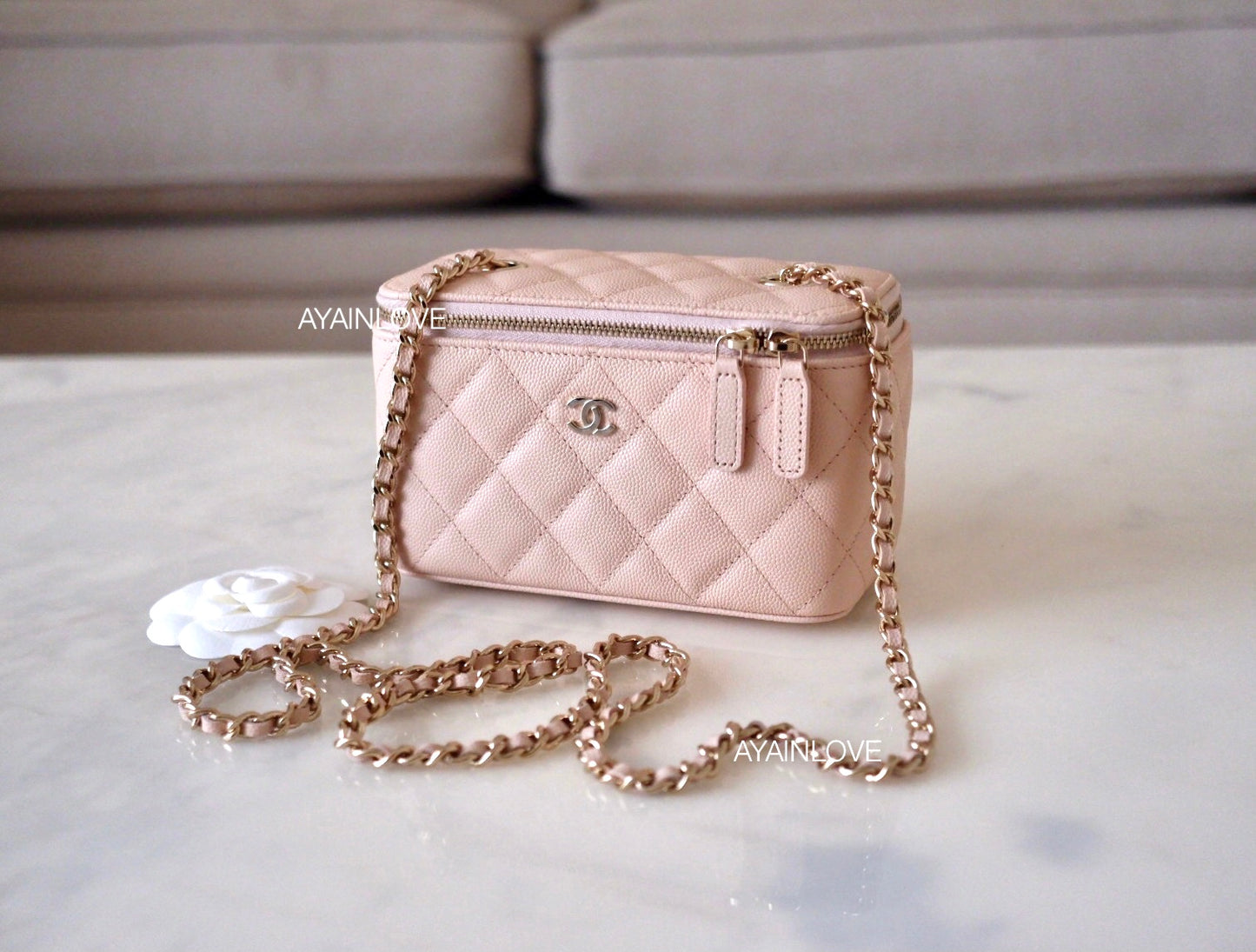 CHANEL Caviar Quilted Mini Vanity Case With Chain Light Pink, FASHIONPHILE