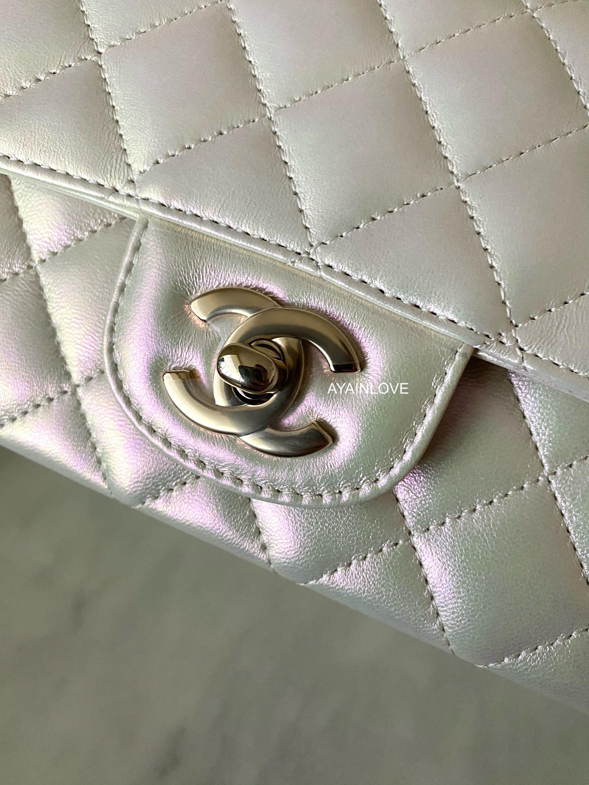 Chanel Iridescent Ivory Quilted Lambskin Classic Flap Mini Light Gold Tone  Hardware Available For Immediate Sale At Sotheby's