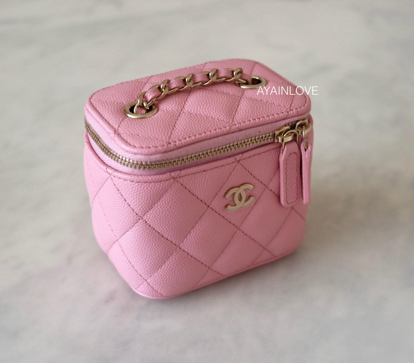Chanel Vertical Vanity In 22C Sakura Pink Caviar LGHW, Luxury, Bags &  Wallets on Carousell