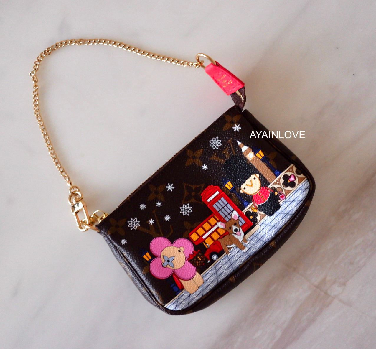 Louis vuitton online vivienne mini pochette