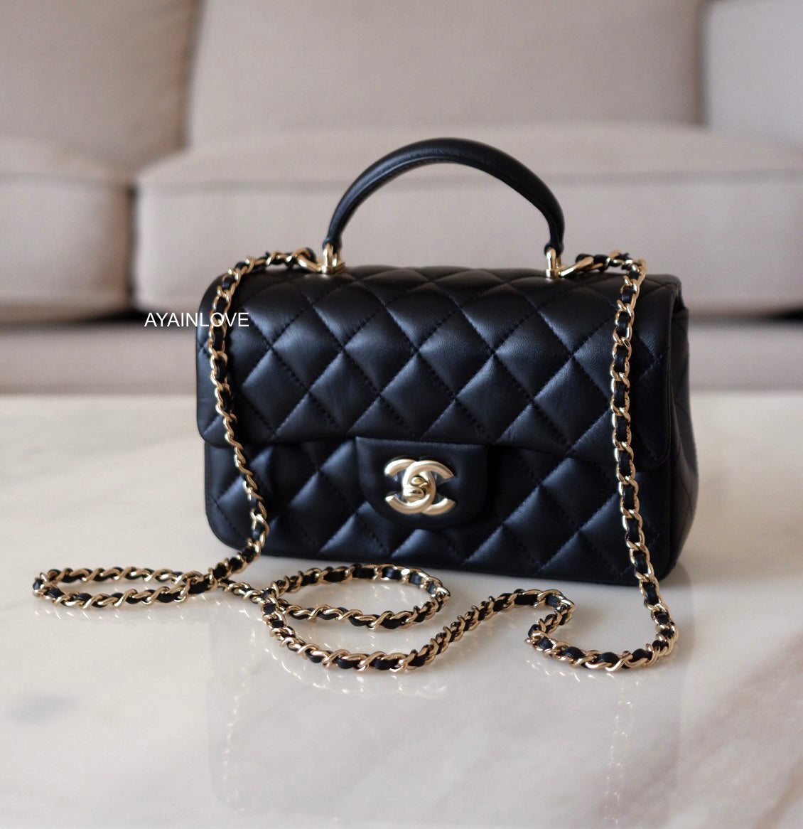 Chanel Black Quilted Lambskin Top Handle Mini Flap Bag Pale Gold Hardware,  2023 Available For Immediate Sale At Sotheby's