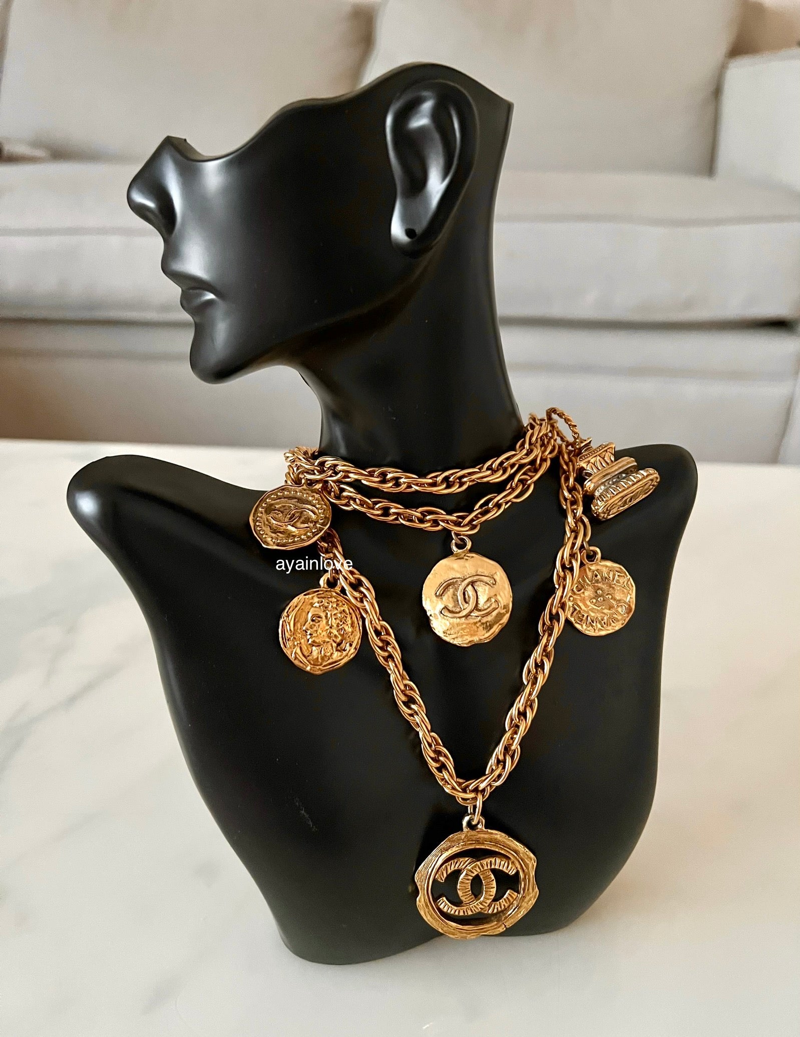 CHANEL 1980s Vintage Charms Medallion Chain Belt Necklace 24K Gold Pla –  AYAINLOVE CURATED LUXURIES