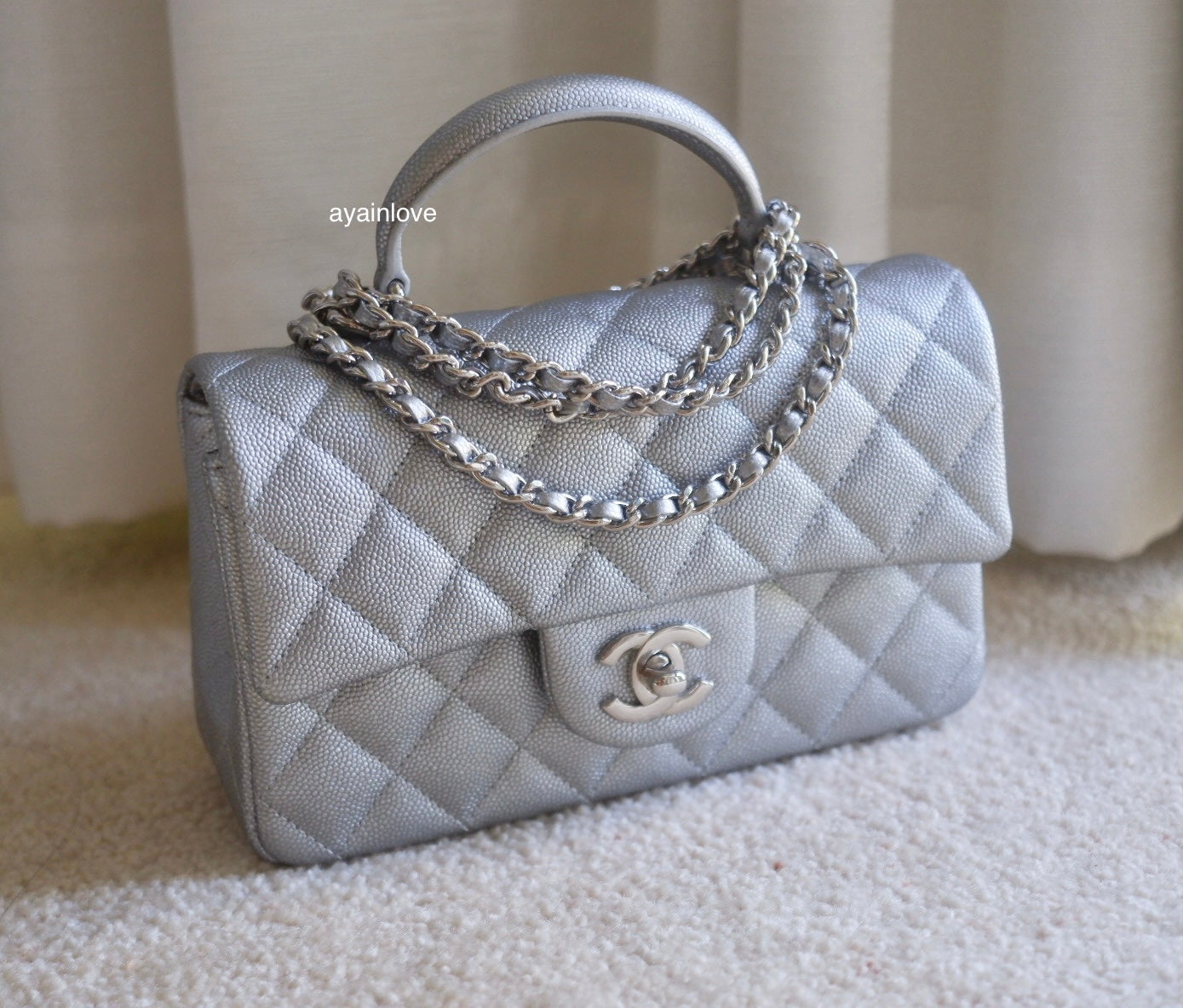 chanel caviar flap bag with top handle