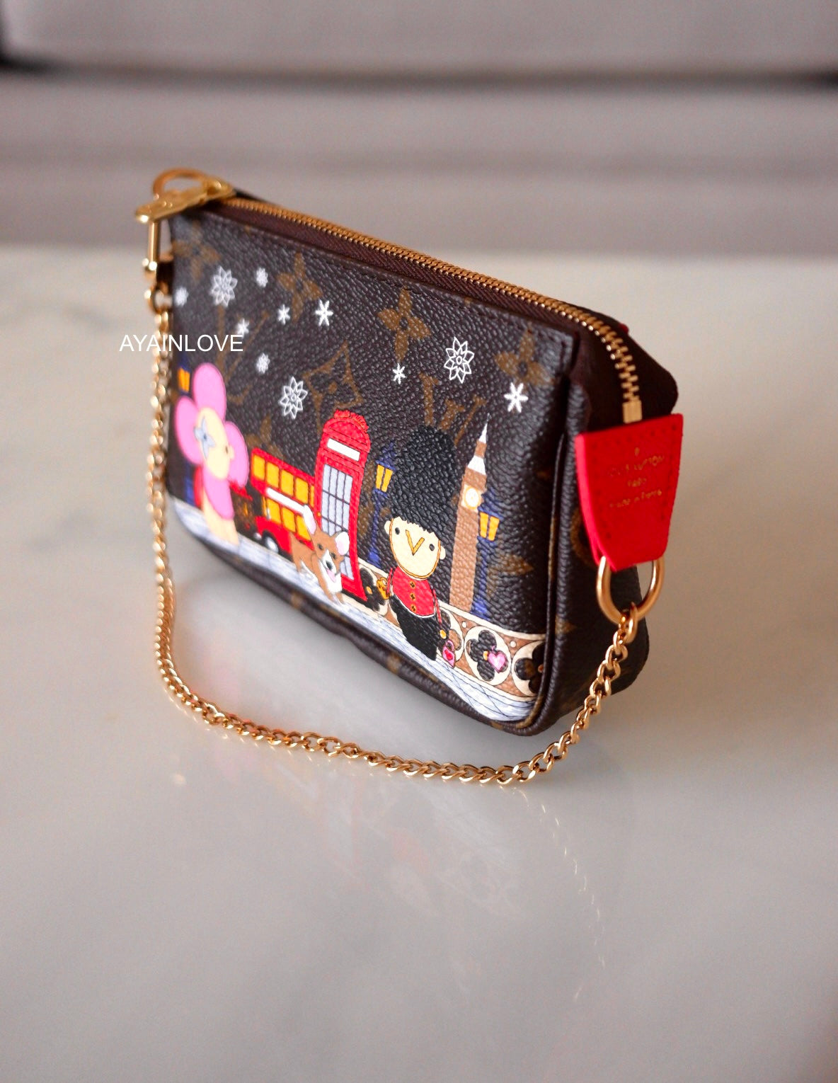 Louis Vuitton, Bags, Louis Vuitton Vivienne Christmas Holiday Animation  Mini Pochette Accessoires